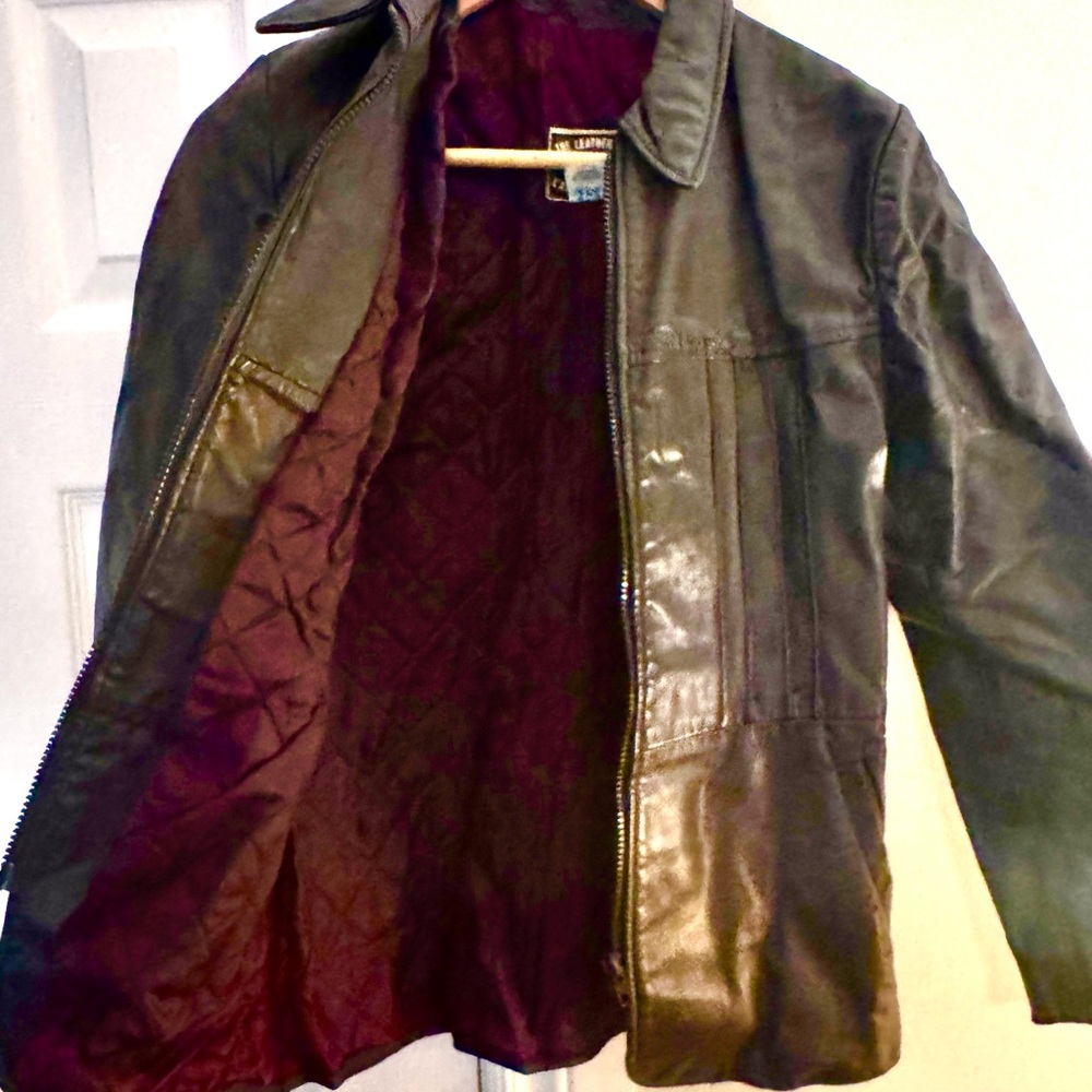 Black vintage Leather Jacket with Burgundy Lining.